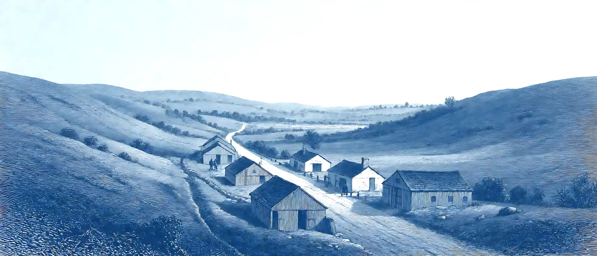 Prussian-blue engraving of a wide valley with one road running along it, small workshops beside the road and hills in the distance.